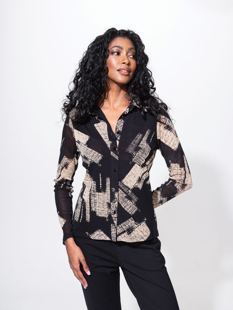 Step into style at Evelin Brandt Belfast with this stunning black & sand multi pattern blouse! Featuring a button-through design with collar, it's the perfect blend of elegance and trendiness. Stay chic and comfortable with its semi-see-through long sleeves. Elevate your wardrobe with this versatile piece that's perfect for any occasion.